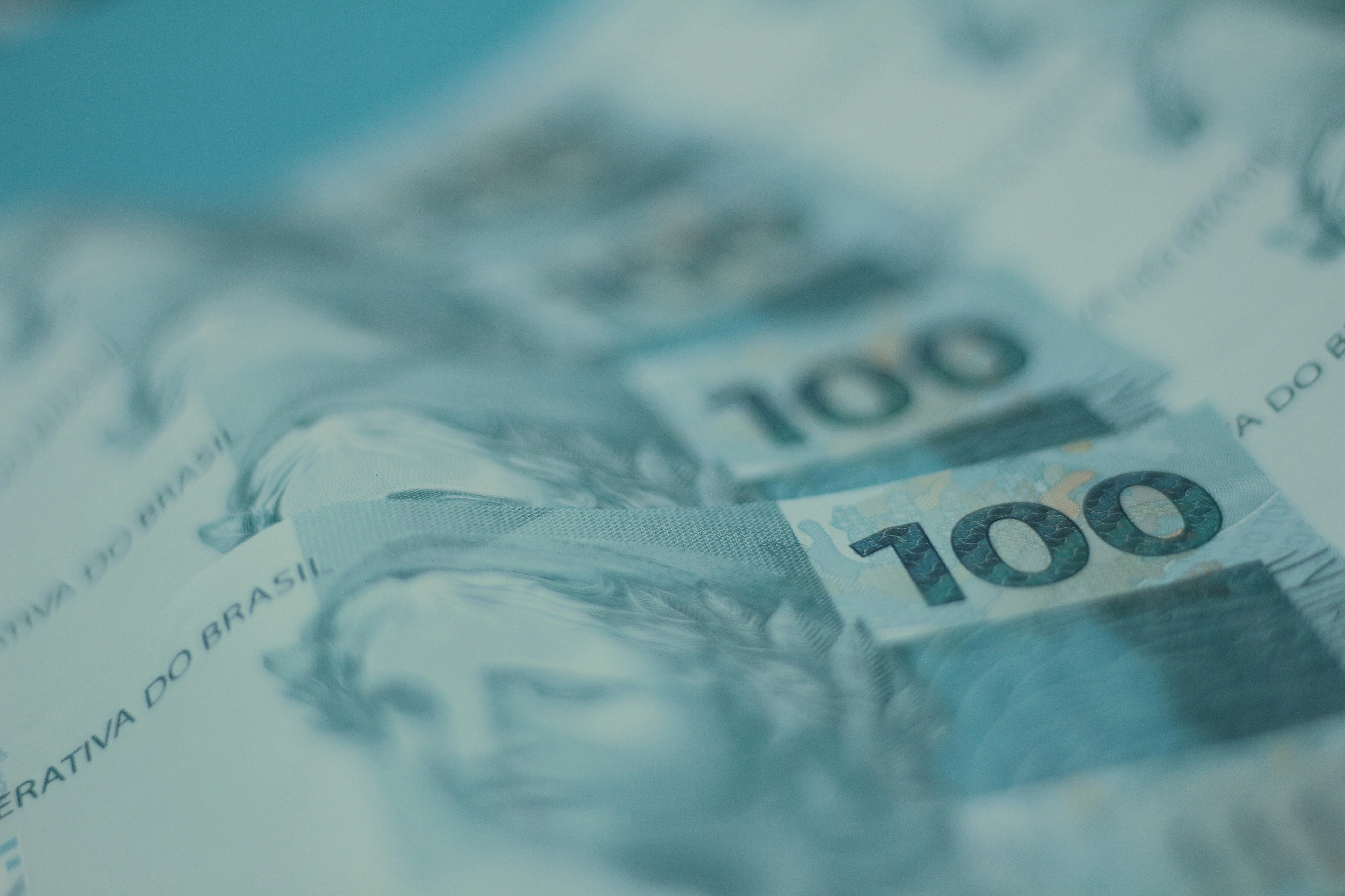 A close up of a hundred dollar bill